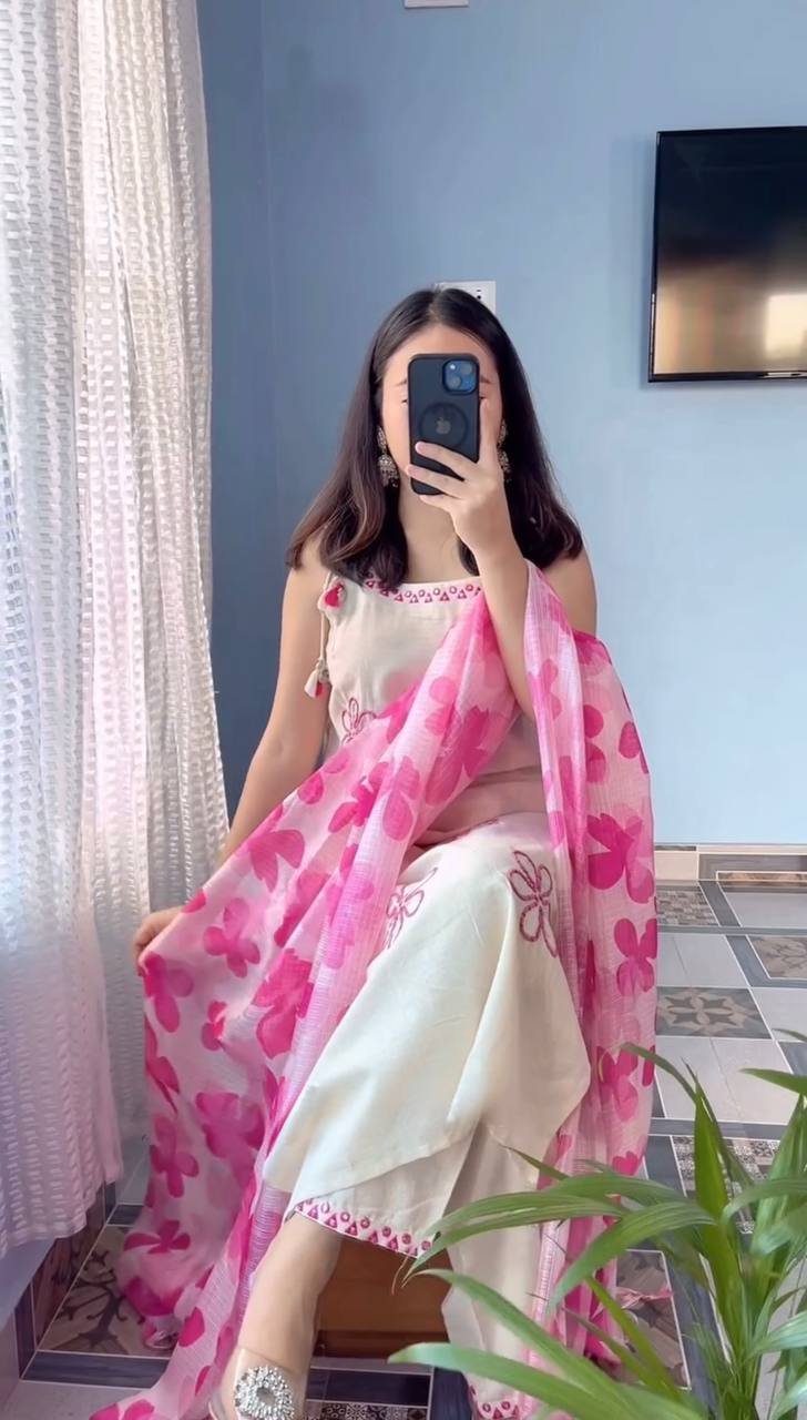 Sleeveless straight kurta with pink embroidered border.