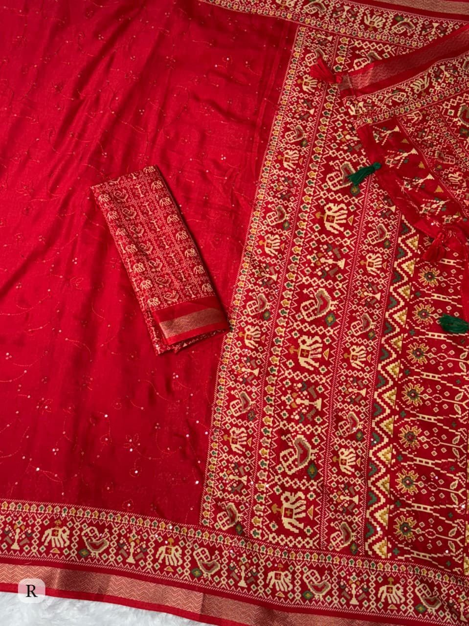 Effortless elegance meets vibrant tradition with this Designer Ajrakh Printed Saree, crafted in pure mul cotton for unmatched comfort and grace. Designed with beautiful thread work and sequin detailing in a classic zaal pattern, this saree is further enhanced with an ajrakh print and rich zari jacquard border, creating a timeless ethnic masterpiece 🌸✨ The stylish tassels on the pallu add a festive touch, making this saree perfect for festive occasions, cultural events, parties, and everyday elegant wear. - Image 6