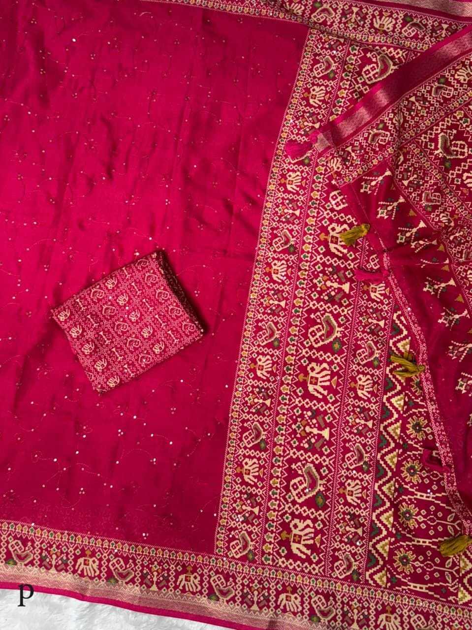 Effortless elegance meets vibrant tradition with this Designer Ajrakh Printed Saree, crafted in pure mul cotton for unmatched comfort and grace. Designed with beautiful thread work and sequin detailing in a classic zaal pattern, this saree is further enhanced with an ajrakh print and rich zari jacquard border, creating a timeless ethnic masterpiece 🌸✨ The stylish tassels on the pallu add a festive touch, making this saree perfect for festive occasions, cultural events, parties, and everyday elegant wear. - Image 8