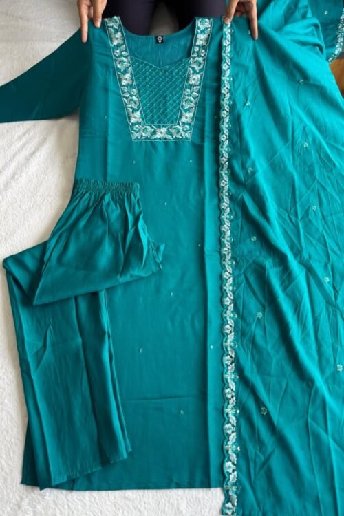 Add elegance and charm to your ethnic collection with this designer Kurti–Pant–Dupatta set, crafted in premium Roman Silk and enhanced with beautiful embroidery thread and sequin work. The rich fabric, graceful colors, and detailed craftsmanship make it perfect for festive wear, parties, and special occasions 🌸✨