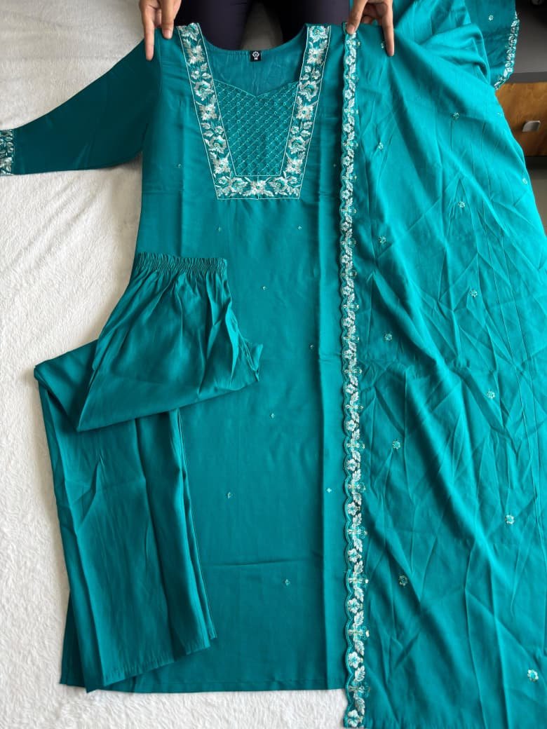 Add elegance and charm to your ethnic collection with this designer Kurti–Pant–Dupatta set, crafted in premium Roman Silk and enhanced with beautiful embroidery thread and sequin work. The rich fabric, graceful colors, and detailed craftsmanship make it perfect for festive wear, parties, and special occasions 🌸✨