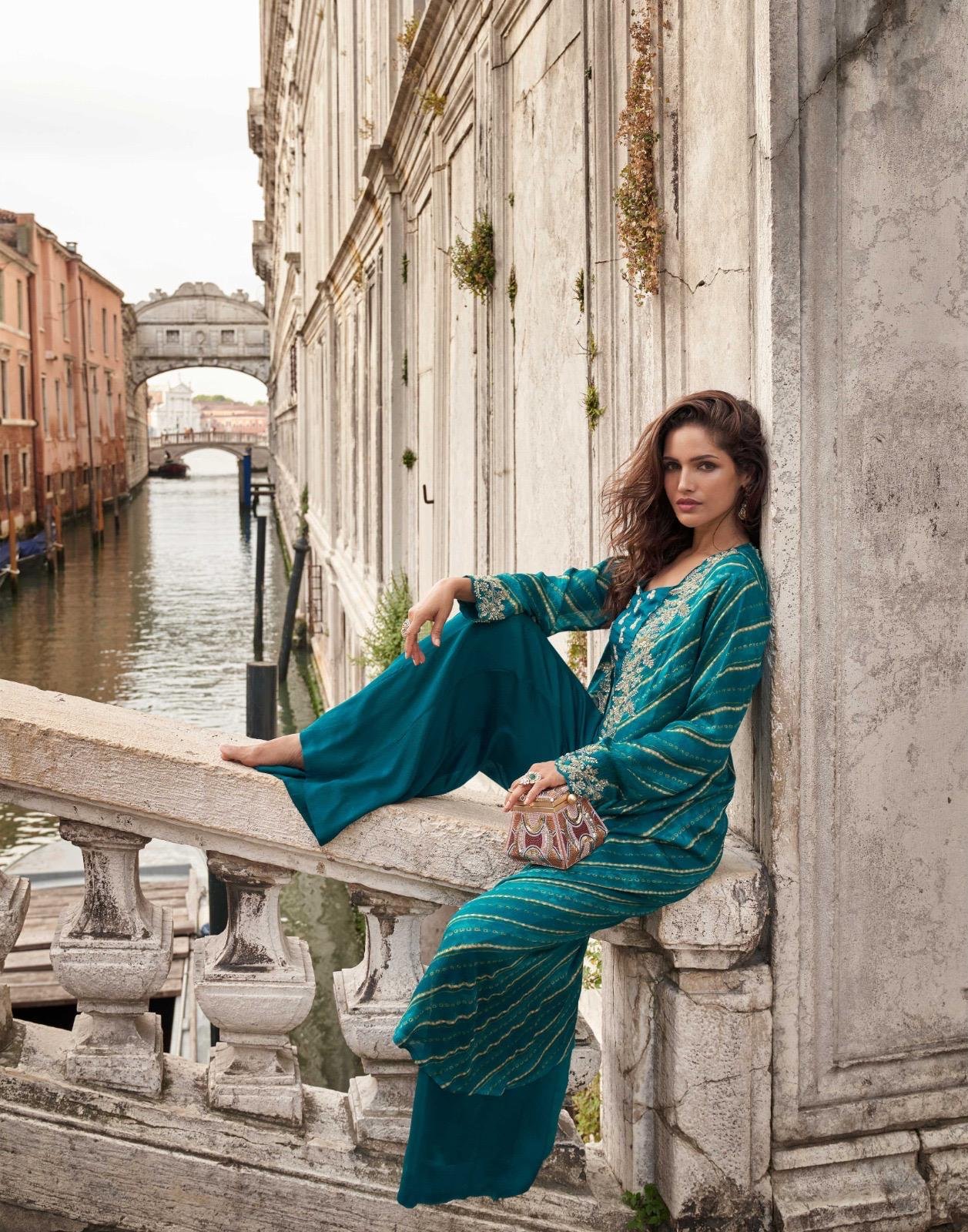 Make a bold festive statement with this trendy festive shrug set, crafted in premium real Chinon Silk & Viscose Jacquard Silk. Designed with front & back heavy embroidery, hand-embellished mirror work blouse, and a stylish plazzo, this outfit delivers a complete luxury ethnic look ✨💃 - Image 2