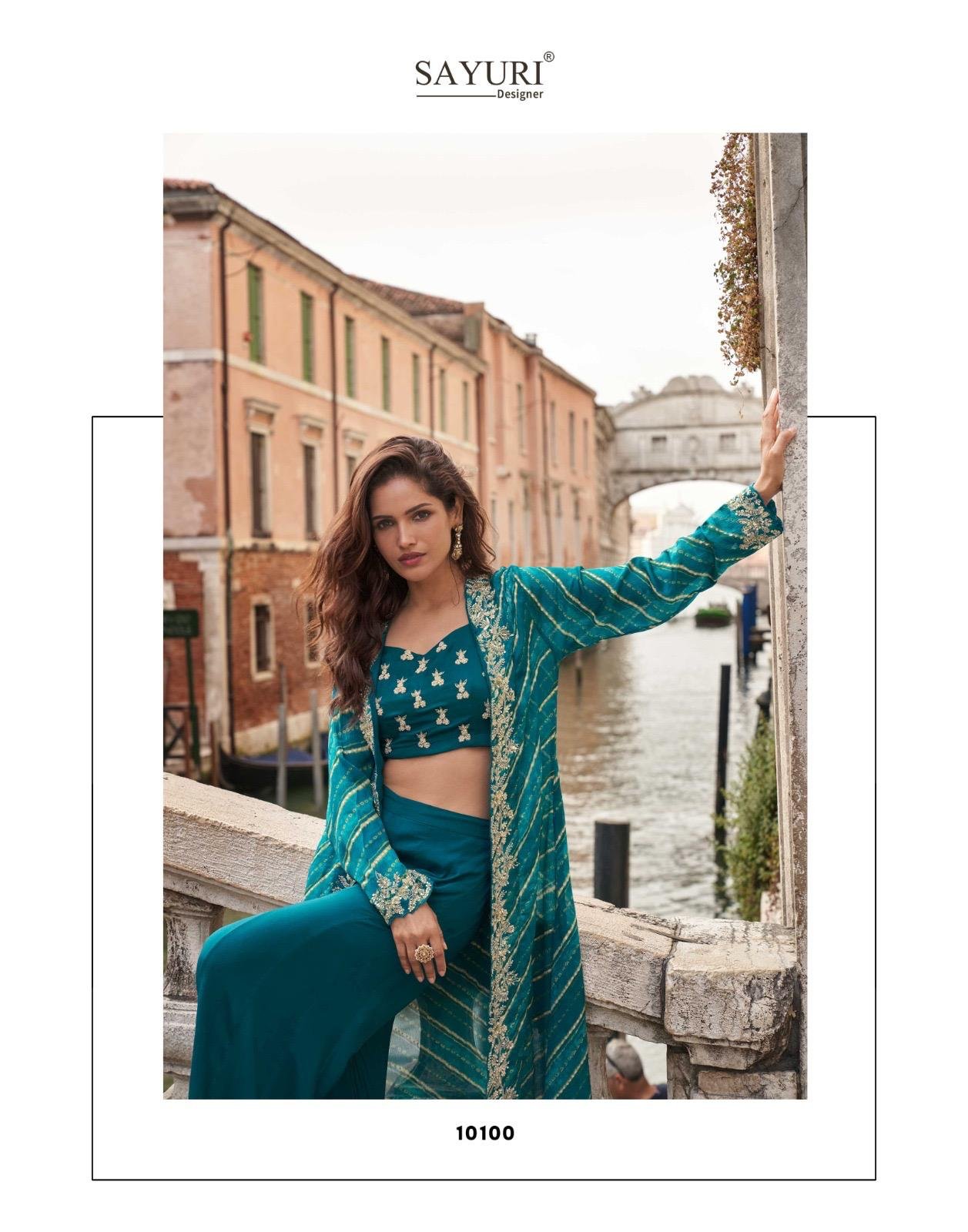 Make a bold festive statement with this trendy festive shrug set, crafted in premium real Chinon Silk & Viscose Jacquard Silk. Designed with front & back heavy embroidery, hand-embellished mirror work blouse, and a stylish plazzo, this outfit delivers a complete luxury ethnic look ✨💃 - Image 4