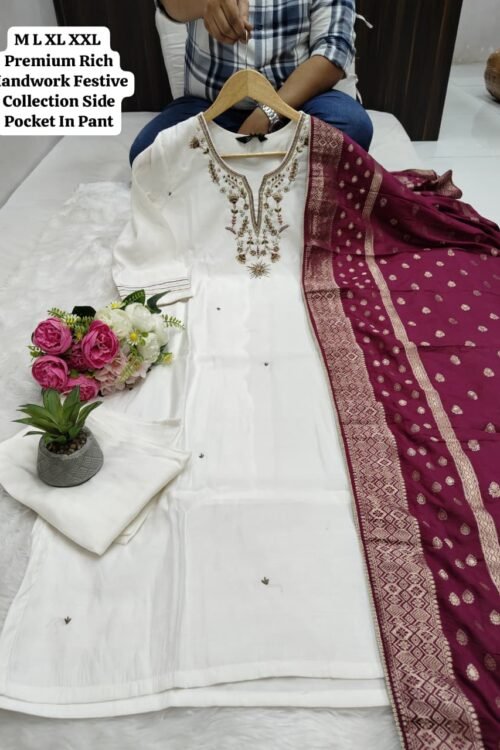 Step into festive elegance with our NEW EXCLUSIVE HANDWORK FESTIVE RICH COLLECTION. This premium Kurti–Pant–Dupatta set is crafted for women who love luxury, detailed handwork, and rich festive vibes. Made from premium silk fabric, the outfit features a beautifully handworked kurti, paired with a matching pant and a heavy-work premium dupatta that completes the royal look—perfect for weddings, festivals, parties, and special occasions