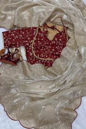 Unveil your inner fashionista with this stunning muted Champagne Gold designer saree, a perfect blend of modern glamour and timeless sophistication. Designed for women who love to make a bold yet classy statement, this saree is ideal for weddings, cocktail parties, receptions, festive nights, and special celebrations.